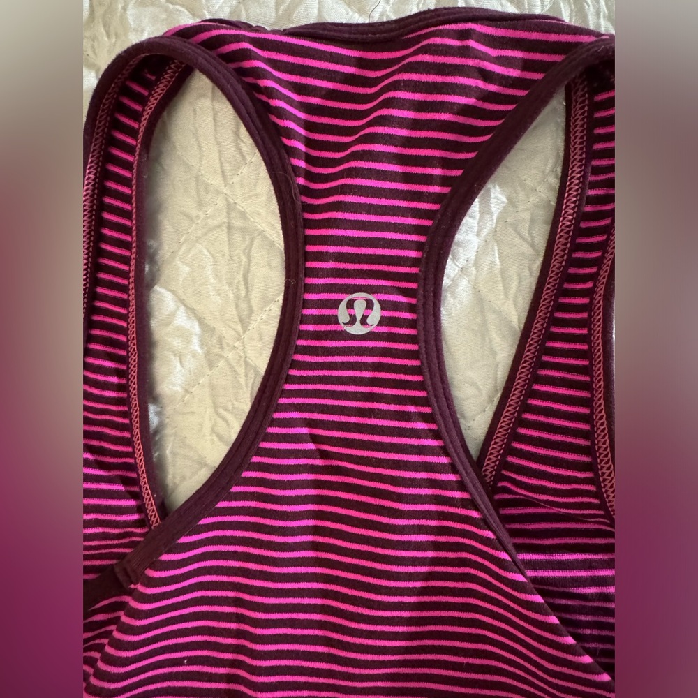 Lululemon women’s pink & purple razorback tank no listing for size, fits as 00
